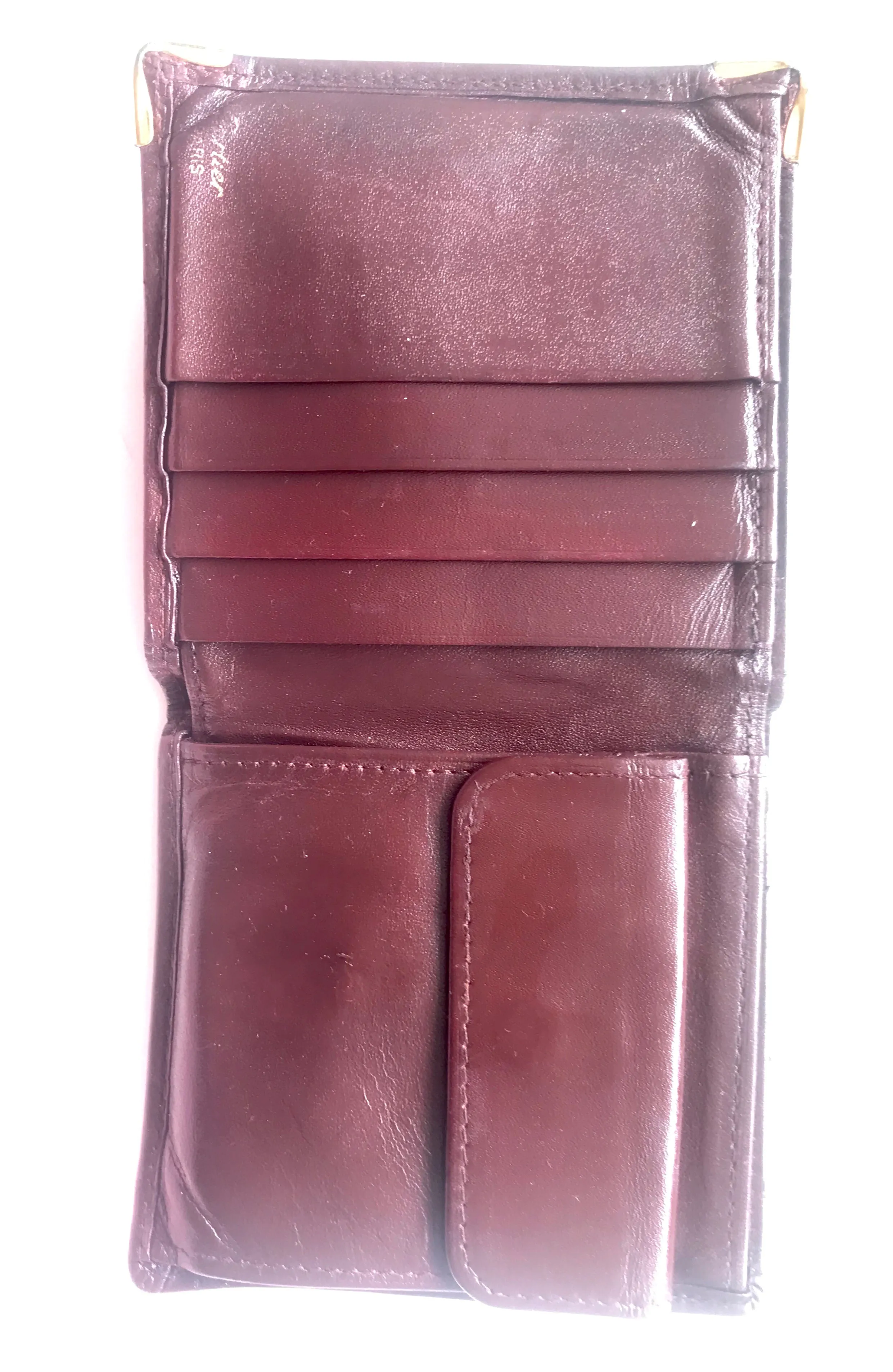 Vintage Cartier, must de Cartier wine leather square wallet with gold tone frames. Unisex use.