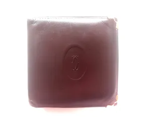 Vintage Cartier, must de Cartier wine leather square wallet with gold tone frames. Unisex use.