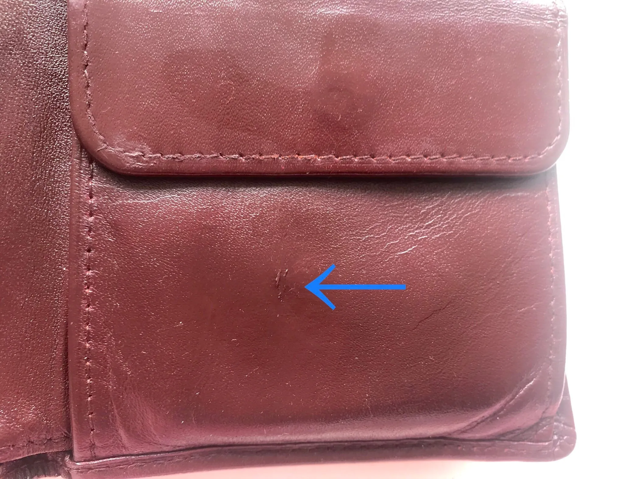 Vintage Cartier, must de Cartier wine leather square wallet with gold tone frames. Unisex use.